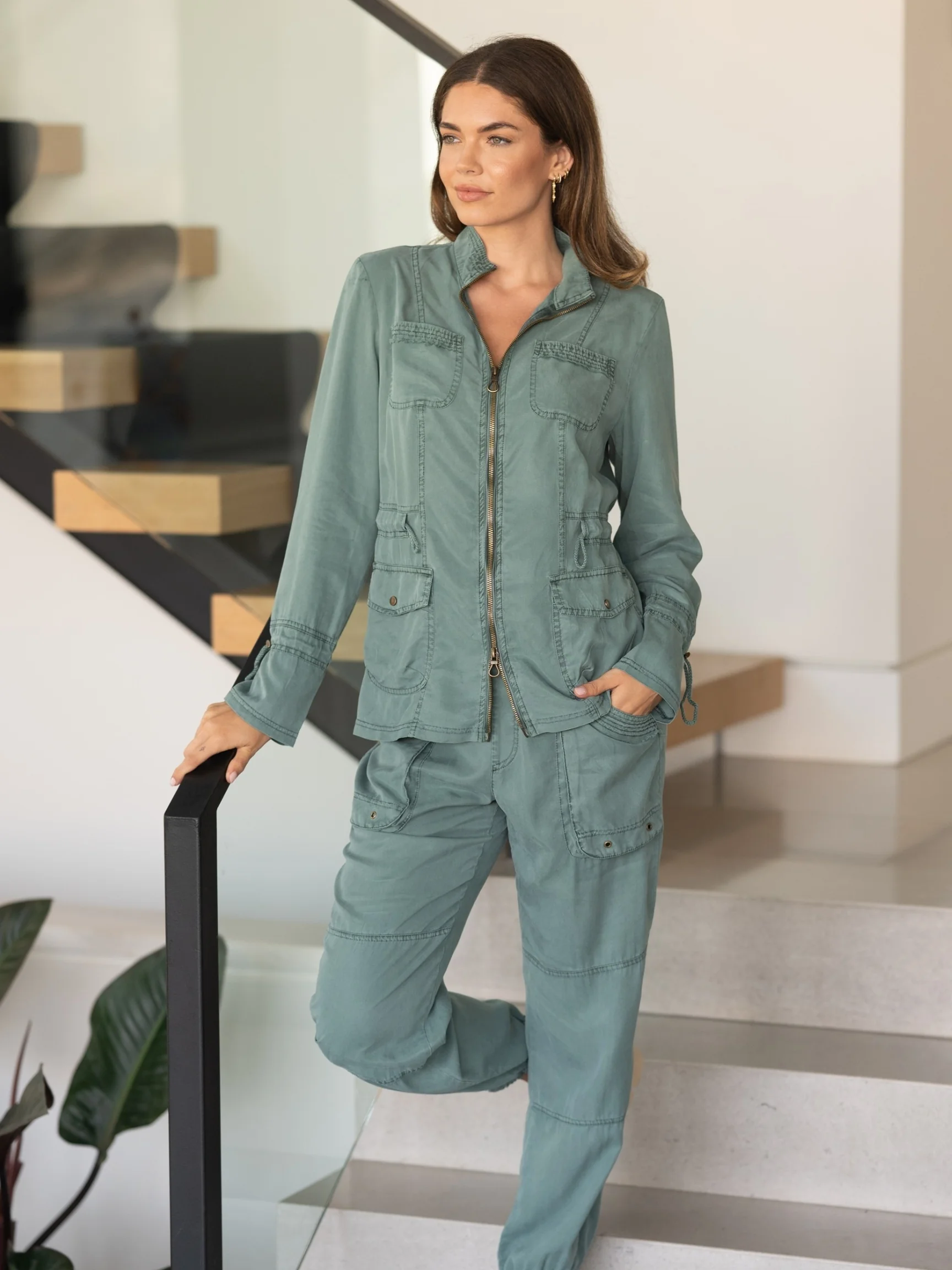The model is wearing size XS